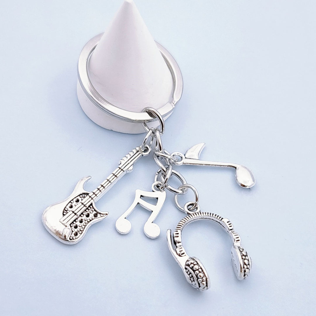 Keychain with musical instruments motifs Bowlift