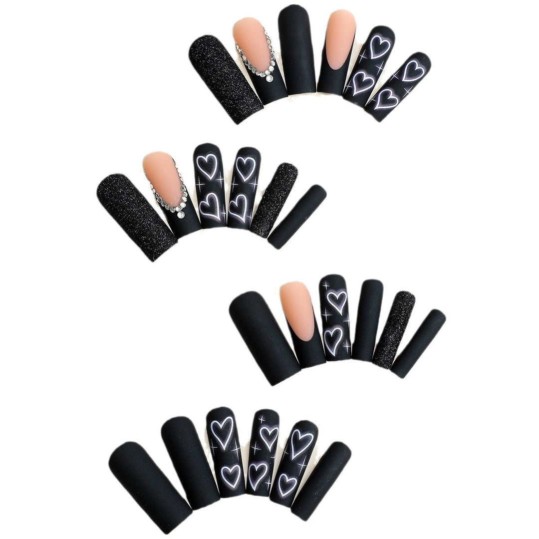 Artistic Heart-Embellished Nail Enhancements Bowlift
