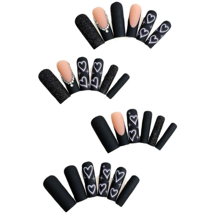 Artistic Heart-Embellished Nail Enhancements Bowlift