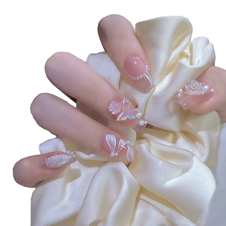 Artificial artificial nails with heart design and glitter elements Bowlift