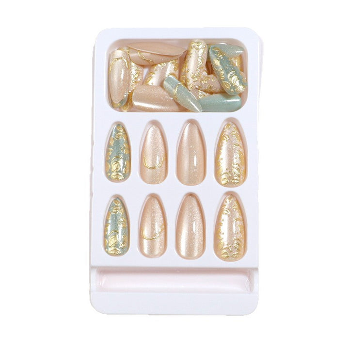 Artistic Stiletto Press-On Nail Set with Elegant Gold Accents Bowlift