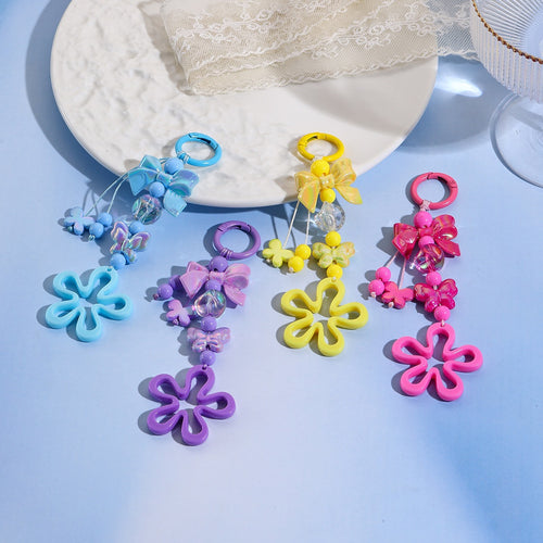 Playful keychain with flower and butterfly details Bowlift