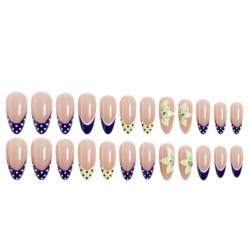 Artful nail tips with floral accent Bowlift