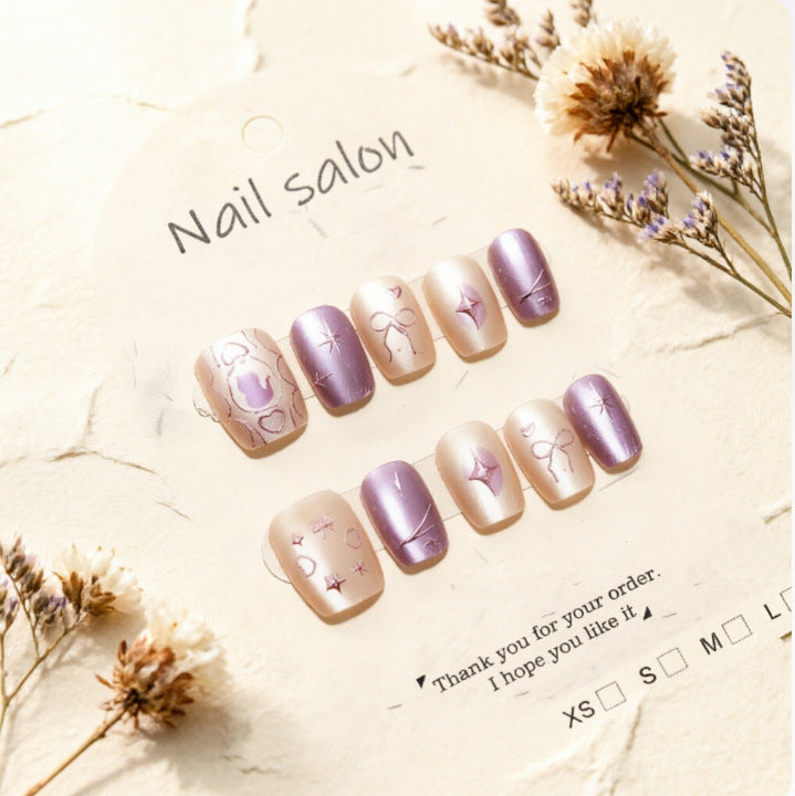 Artificial nails with playful bow and star design Bowlift