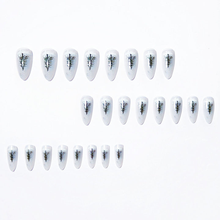 Elegant artificial nails with wintery Christmas tree motif Bowlift