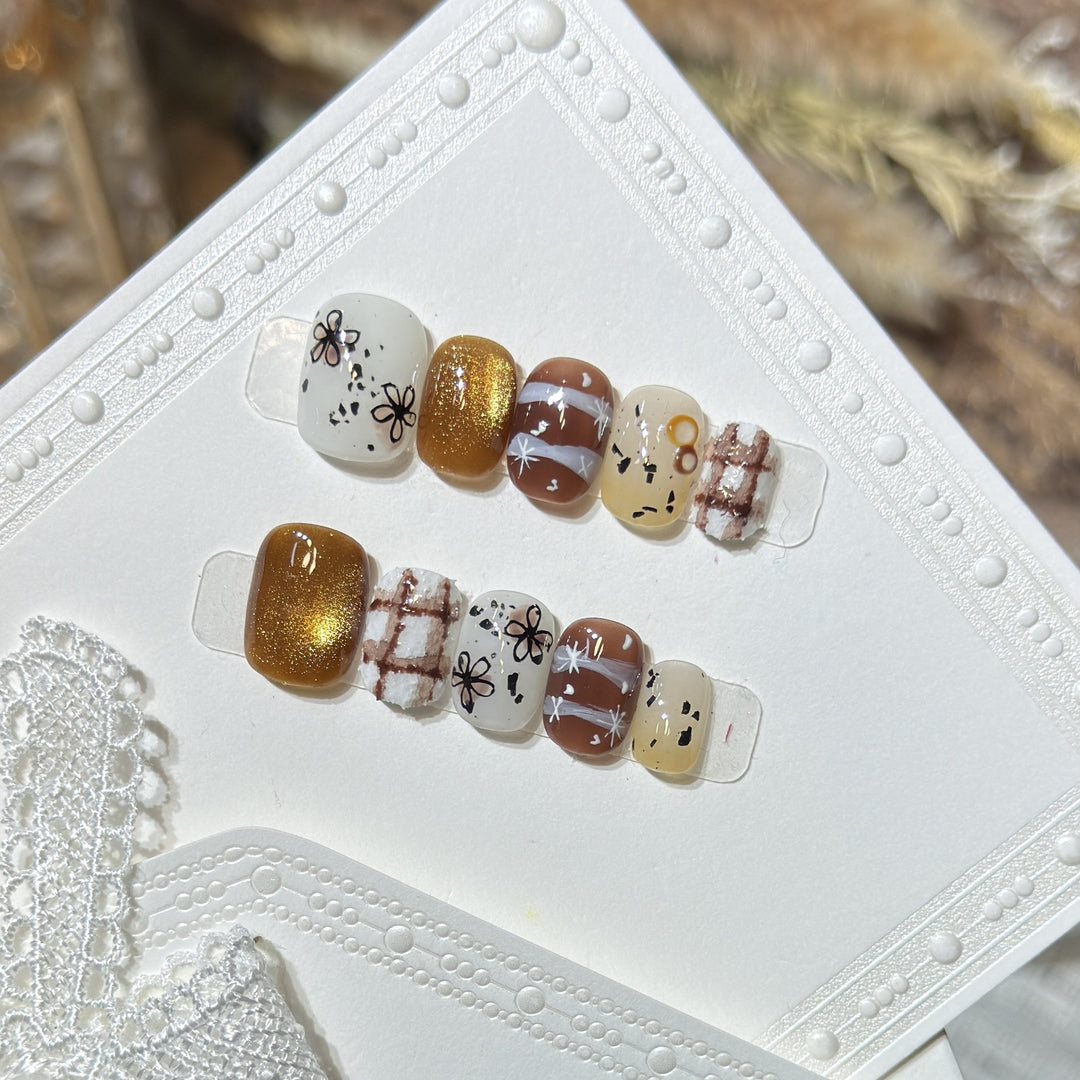 Artistic Press-On Nail Set with Unique Design Elements Bowlift