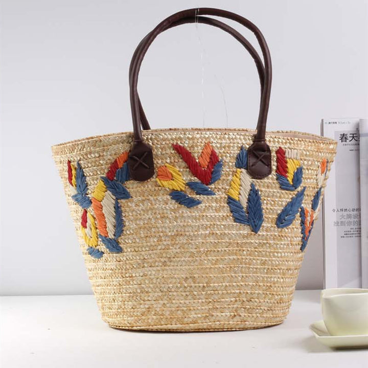 Braided beach bag with colorful embroidery pattern Bowlift