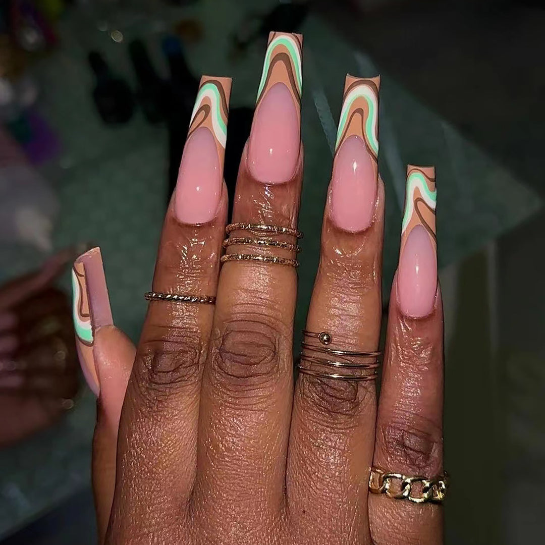 Artful acrylic nails with elegant wave design Bowlift