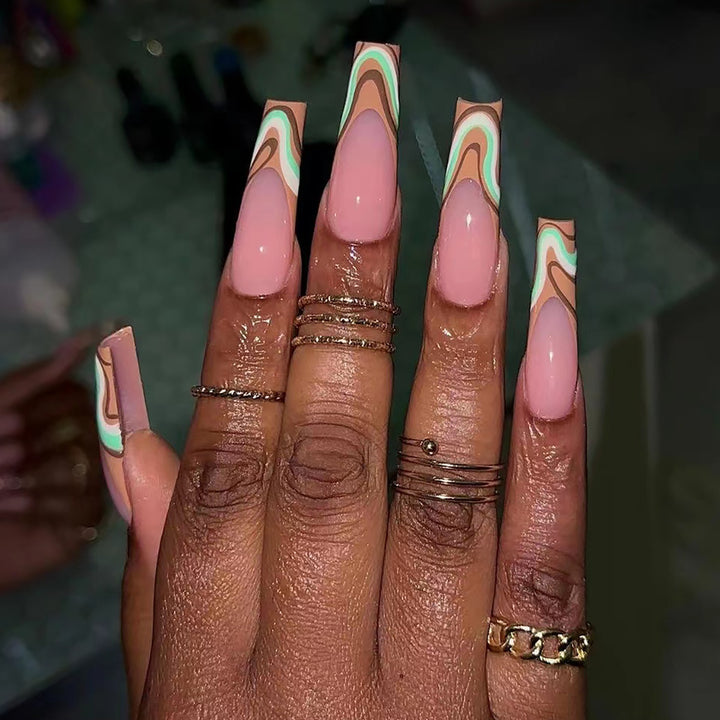 Artful acrylic nails with elegant wave design Bowlift