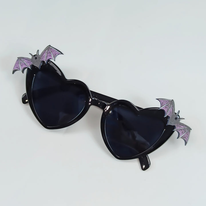 Heart-Shaped Sunglasses with Bat Accents Bowlift