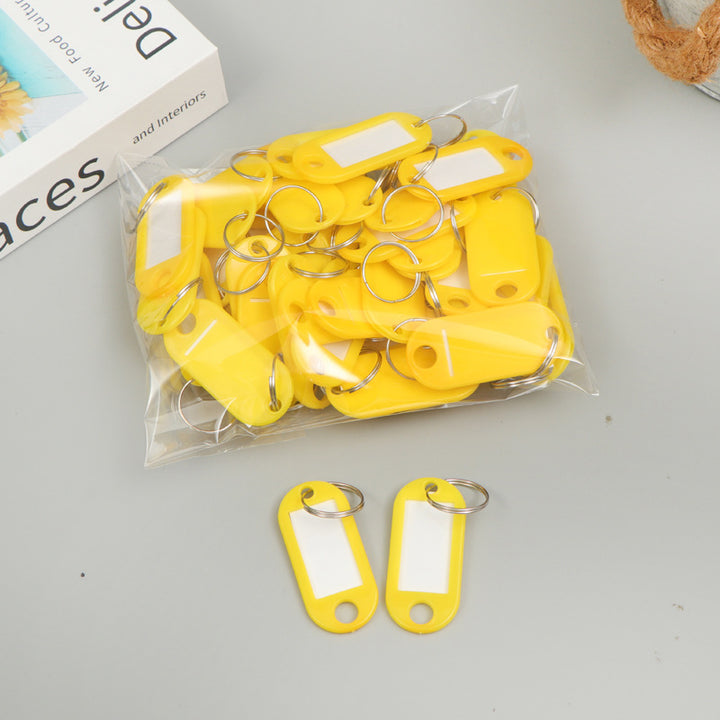 Unisex writable keychain with clear labeling field Bowlift