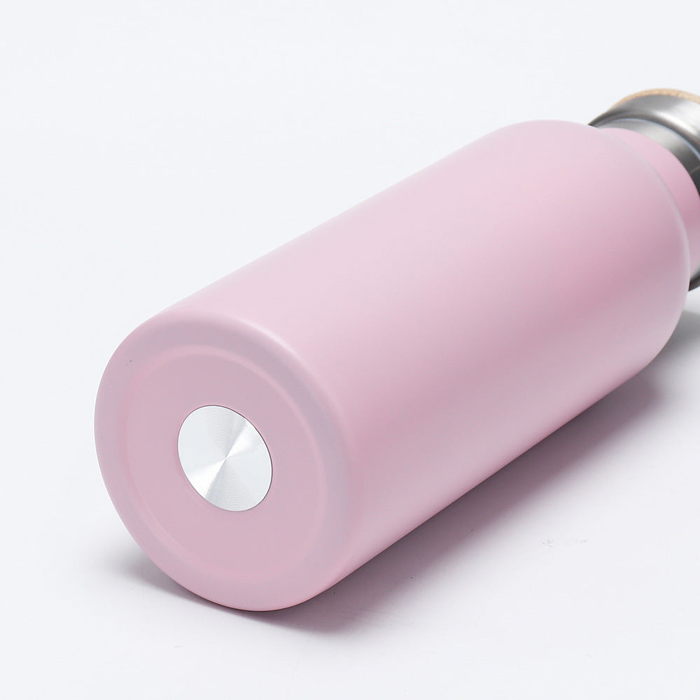 Women's insulated stainless steel drinking bottle with wooden lid Bowlift