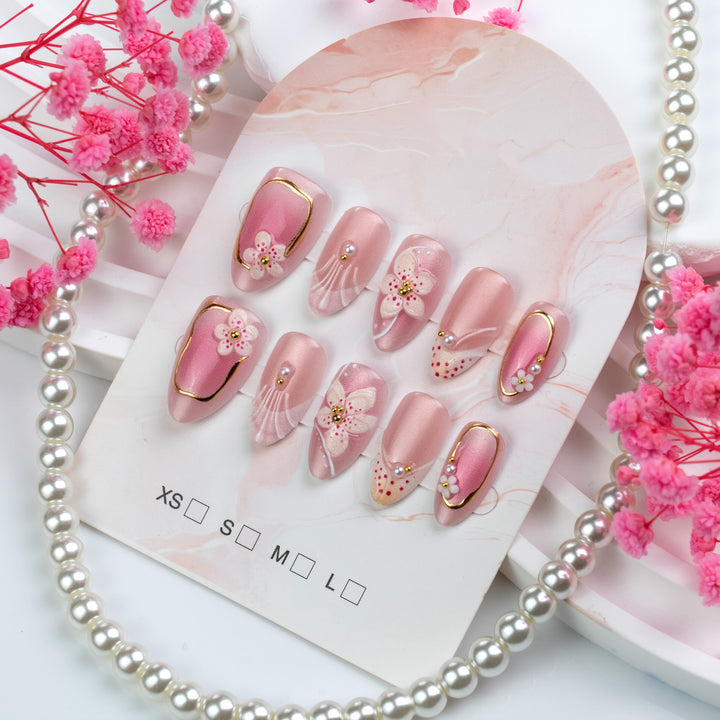 Nail set with floral design and elegant accents Bowlift