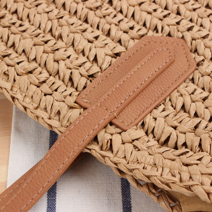 Beach bag with fringed design made of natural woven material Bowlift