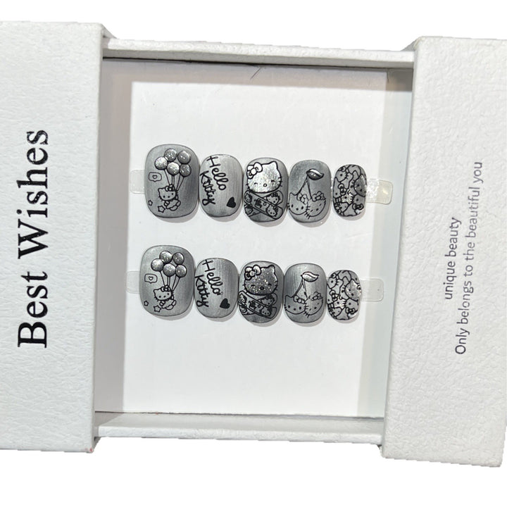 Artistic Press-On Nail Set with Whimsical Character Designs Bowlift