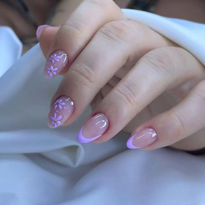Creative artificial nails with floral accents Bowlift