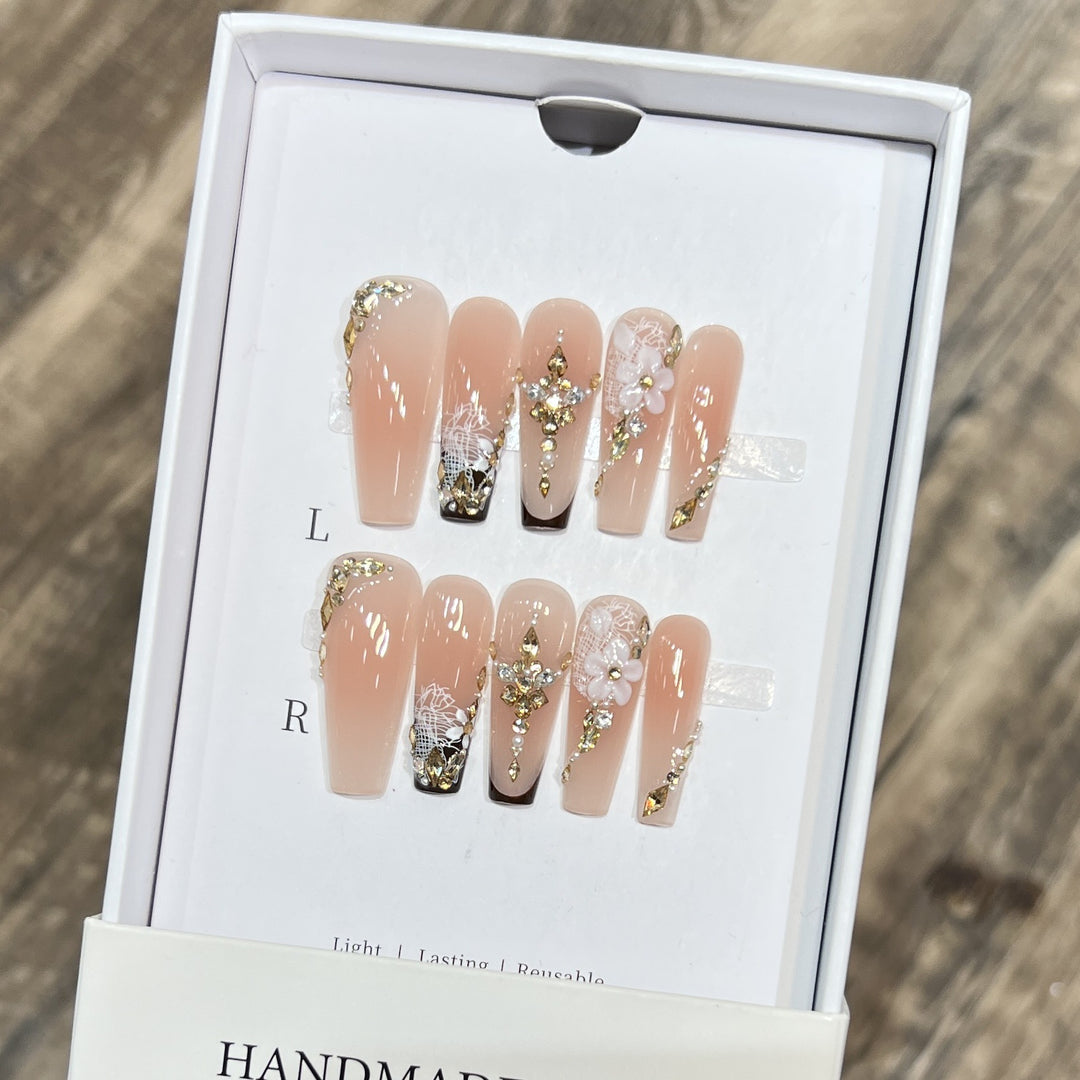 Artistic Reusable Press-On Nail Set with Floral and Gold Accents Bowlift