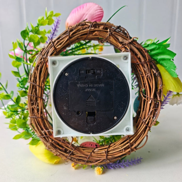 Decorative table lantern with artificial flowers and ribbon Bowlift