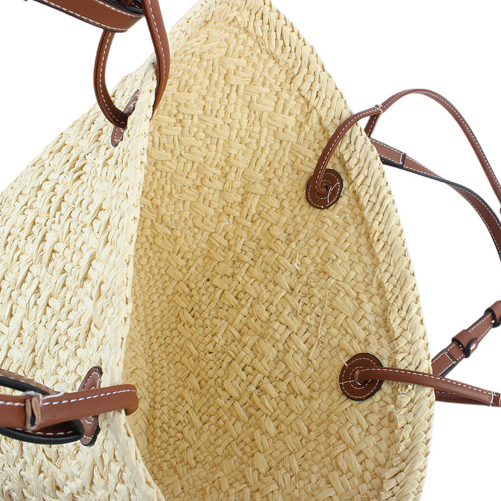 Elegant handbag made of woven natural material with sturdy leather handles Bowlift