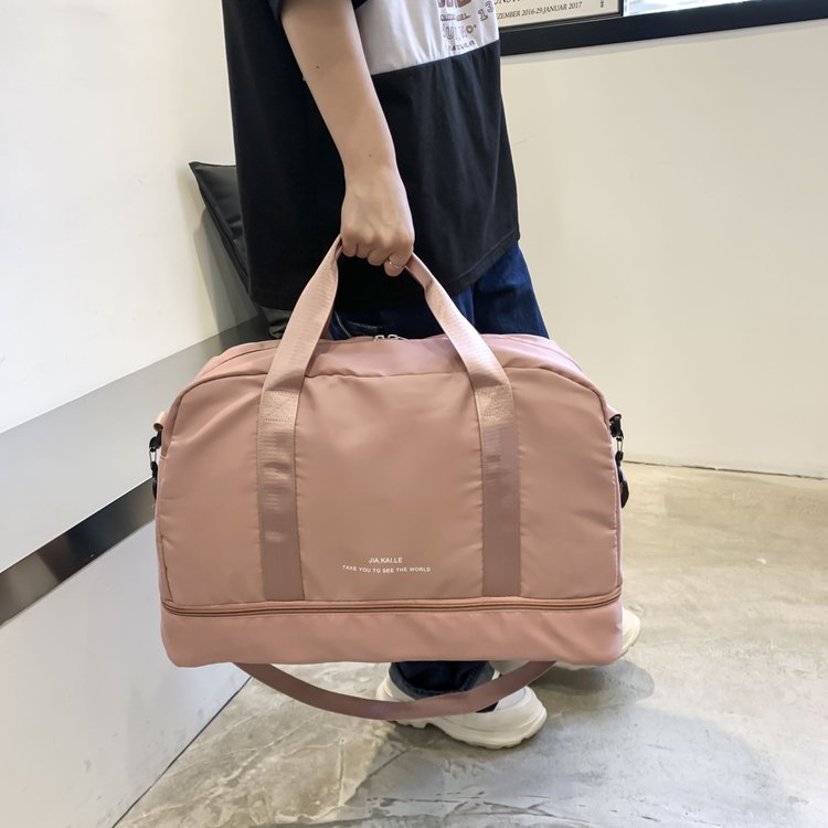 Sporty Travel Bag With Spacious Interior Compartment And Removable Shoulder Strap Bowlift