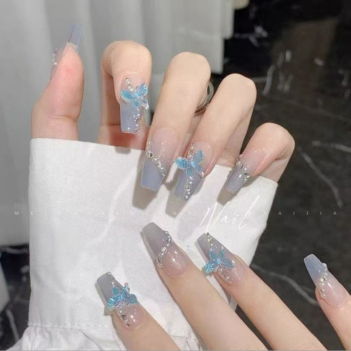 Artful Nail Extensions with Butterfly Design Bowlift
