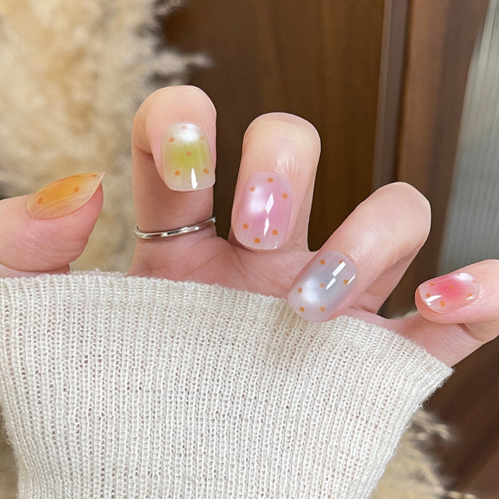 Artistic Press-On Nail Set with Polka Dot Designs Bowlift