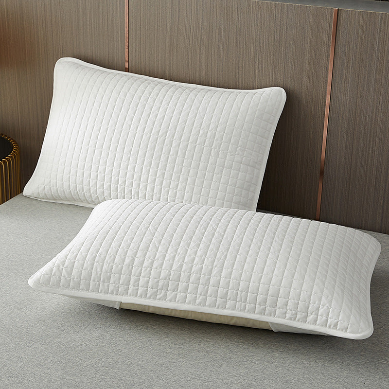 Quilted breathable zippered pillow protector with hypoallergenic padding Bowlift