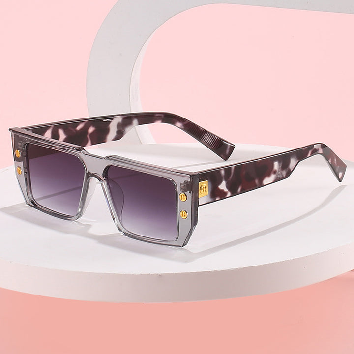 Women's fashionable clear glasses with golden accents Bowlift