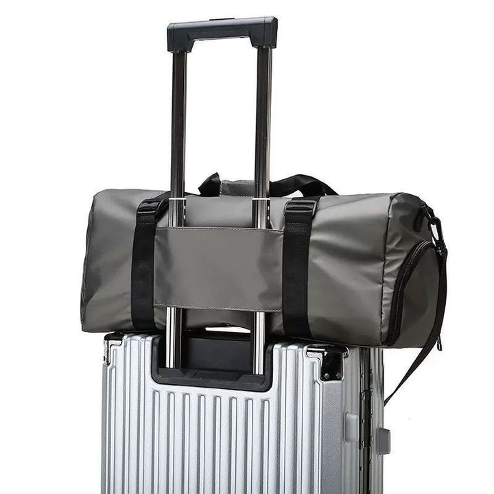 Travel bag with integrated trolley attachment system Bowlift