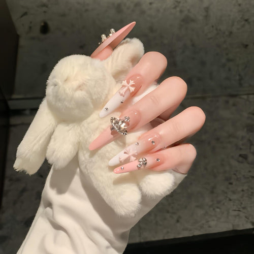 Acrylic nails with rhinestone embellished accents Bowlift