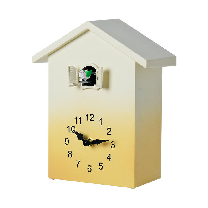 Cuckoo clock in creative house design Bowlift