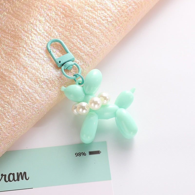Playful keychain with balloon dog and beads Bowlift