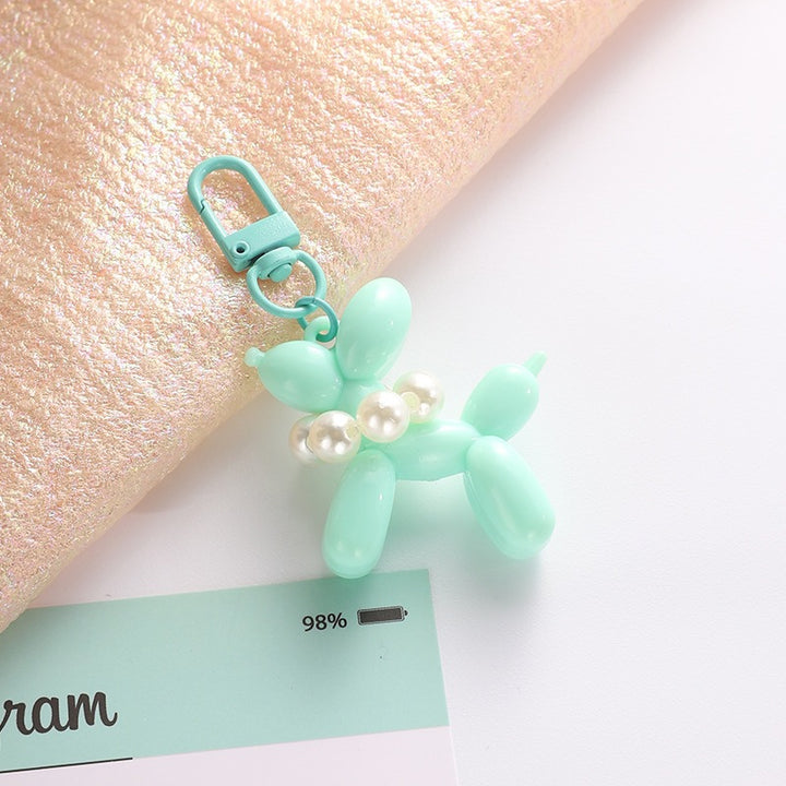 Playful keychain with balloon dog and beads Bowlift
