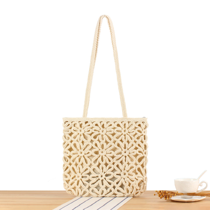 Handbag made of artistic macramé with floral details Bowlift