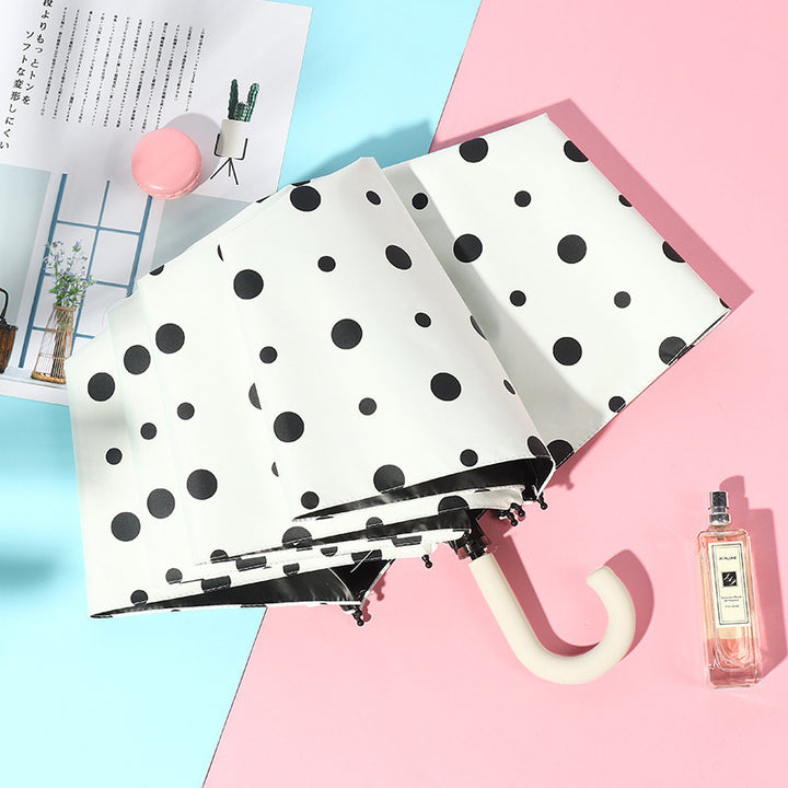 Ladies compact folding umbrella with elegant design and ergonomic wooden handle Bowlift
