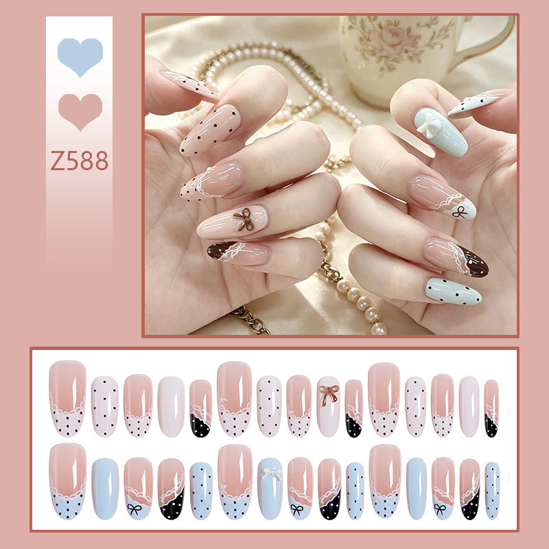 Artificial nail set with elegant accents and fine designs Bowlift