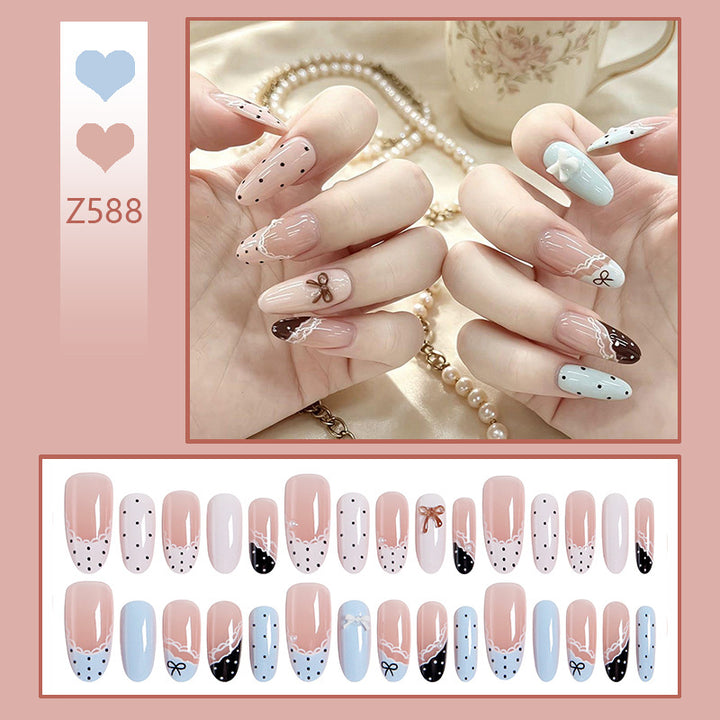 Artificial nail set with elegant accents and fine designs Bowlift