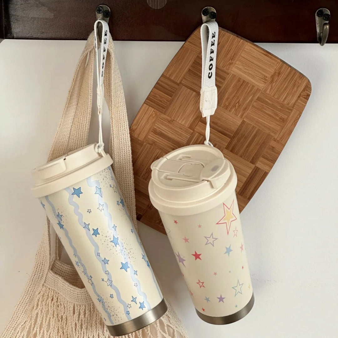 Women's insulated mug with practical carrying handle and charming Hello Kitty design Bowlift