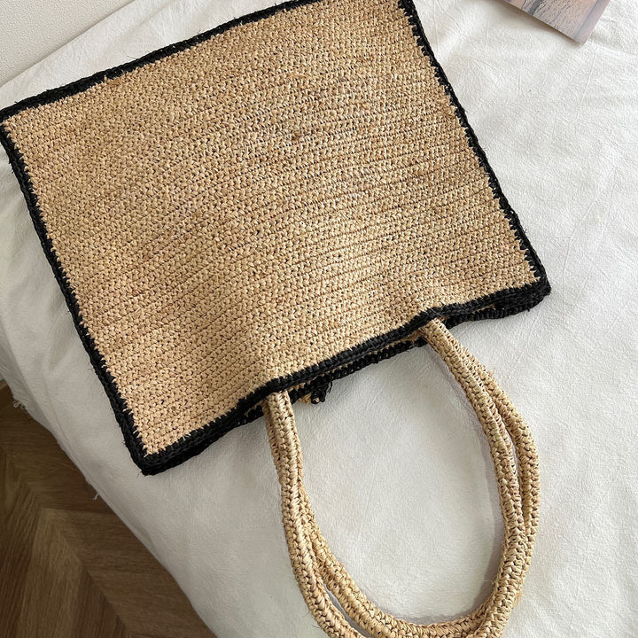 Handcrafted knitted bag with floral design Bowlift