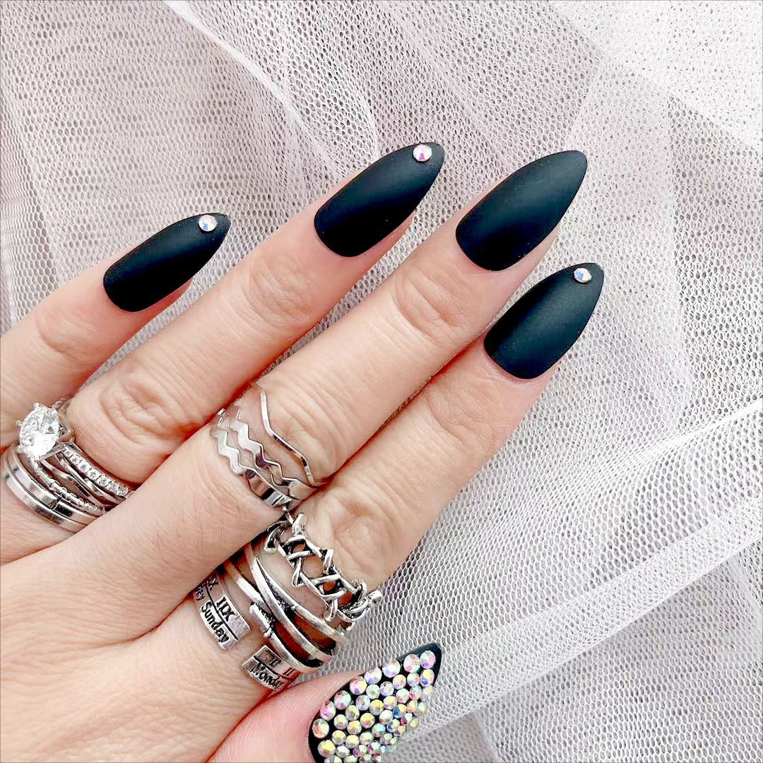 Artificial nail set with matte finish and sparkling accents Bowlift