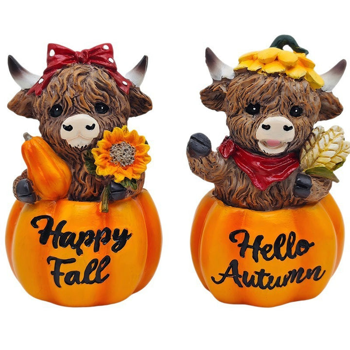 Funny decorative figure of a Highland cow in pumpkin costume Bowlift