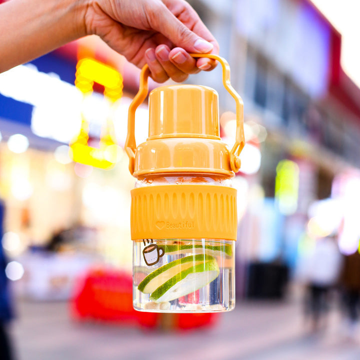 Ladies trendy glass drinking bottle with practical silicone protection Bowlift