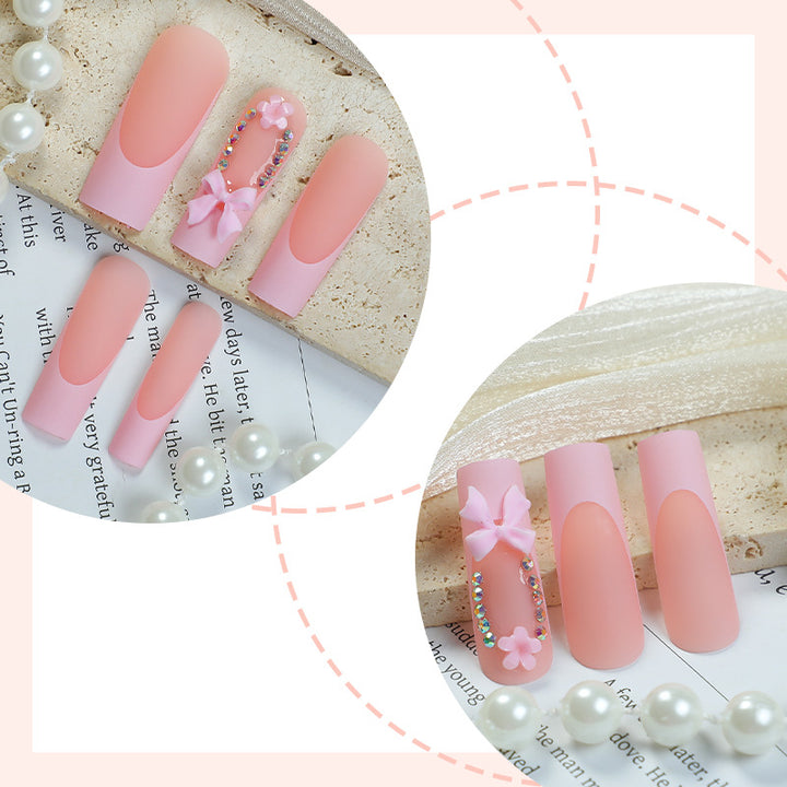 Decorative Press-On Nail Art with Floral and Bow Accents Bowlift