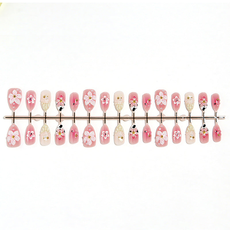 Luxurious artificial nails with floral decorations Bowlift