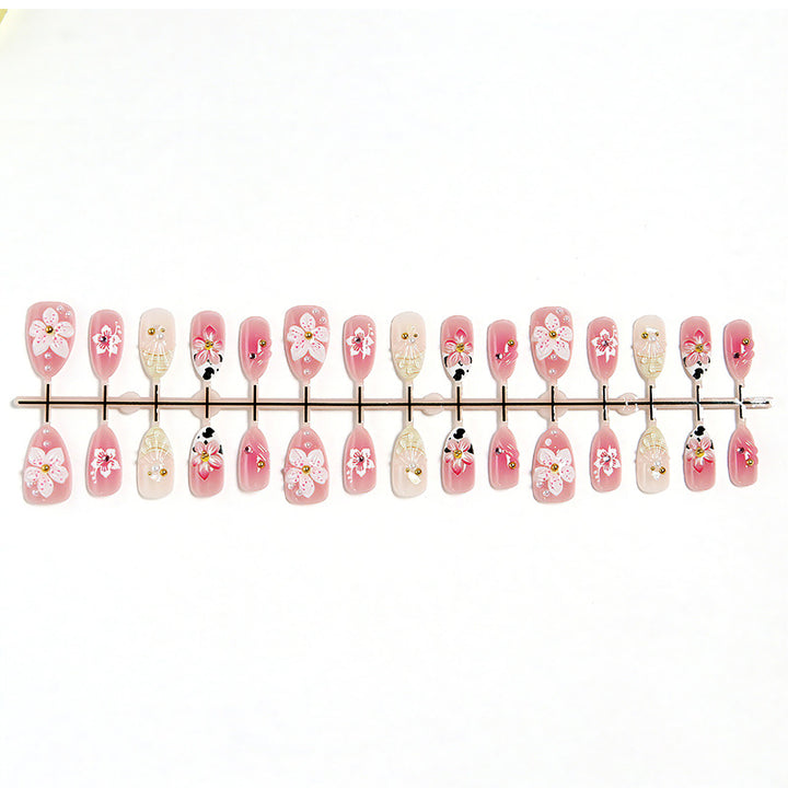 Luxurious artificial nails with floral decorations Bowlift