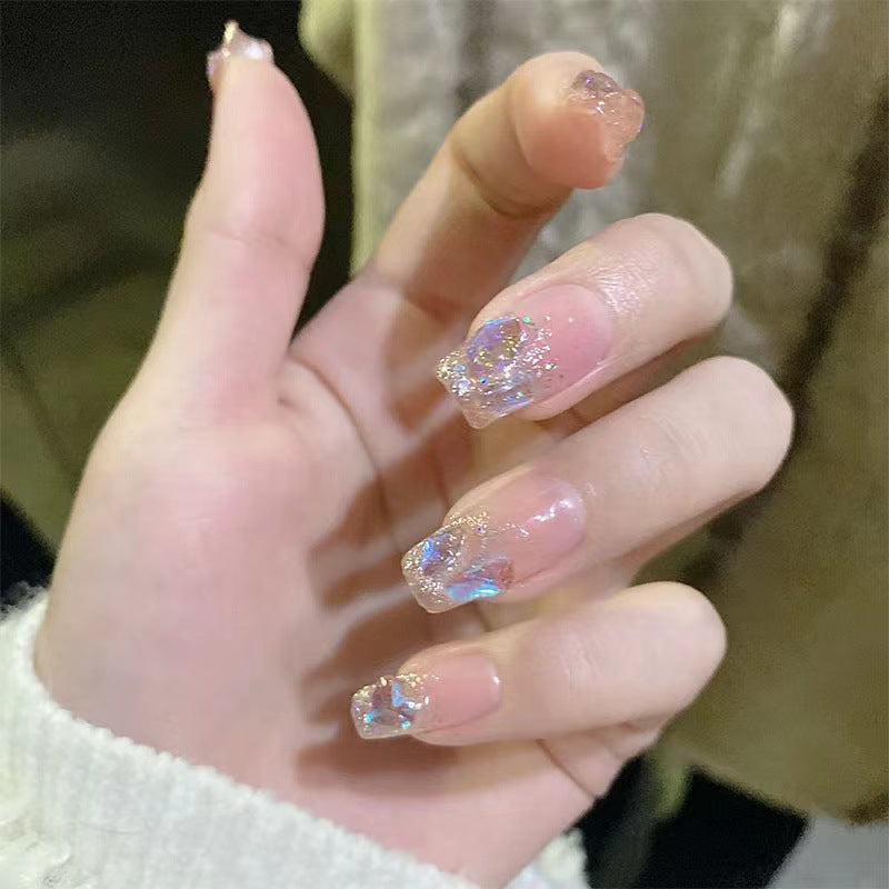 Artificial nails with heart accent and glamorous decorations Bowlift