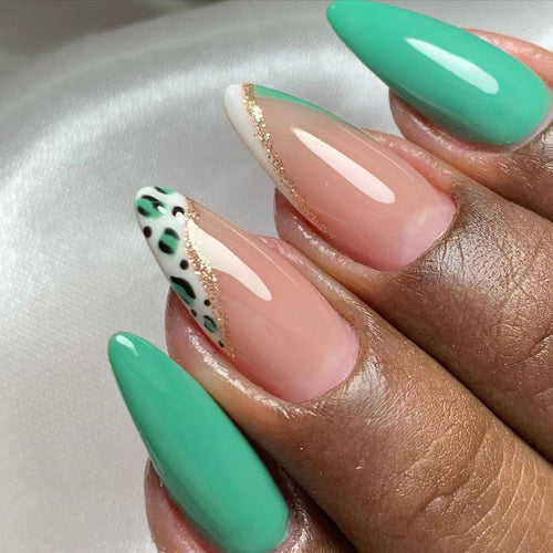 Artistic stiletto nails with glamorous color play Bowlift