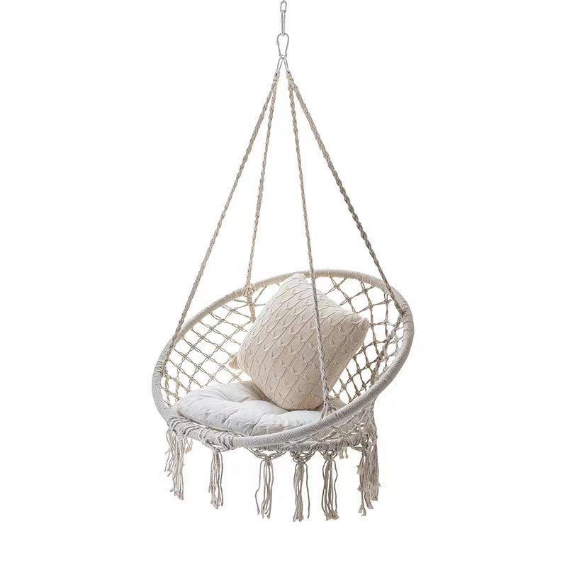 Boho macrame hanging swing chair with faux fur cushion and fringe Bowlift