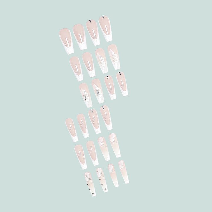 Glamorous stiletto artificial nails with floral details Bowlift