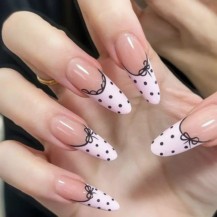 Elegant artificial nails with bow design and dots Bowlift
